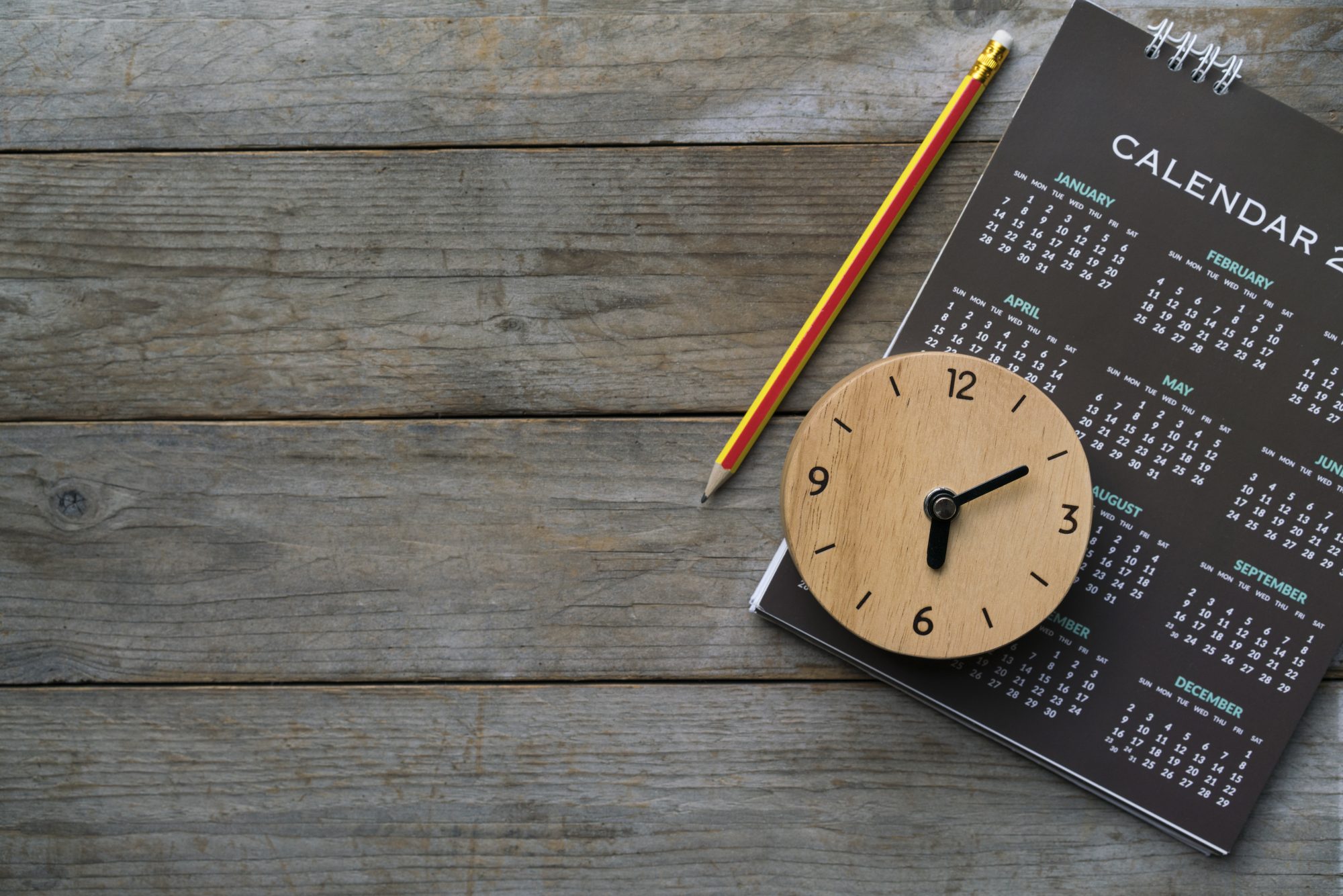 Image of a calendar and clock implying a term for savings